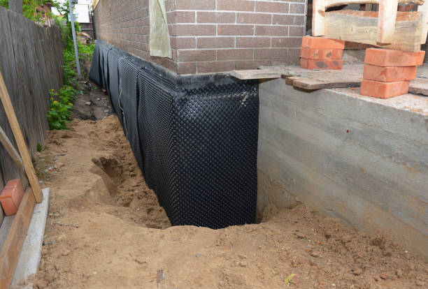 SJ Waterproofing Pros technician performing targeted Waterproofing assessment in Quincy, WA